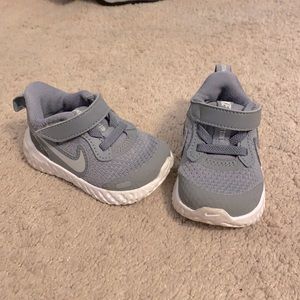 Nike gray/white Velcro close baby shoes